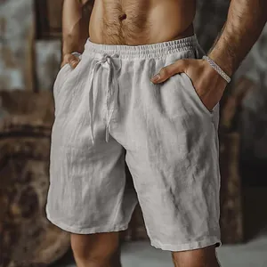 Comodi pantaloncini da uomo in cotone e lino bianco traspirante con coulisse in vita.