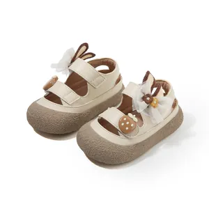 Cute toddler girl closed-toe sandals with rabbit ears and lace bows for summer walking.