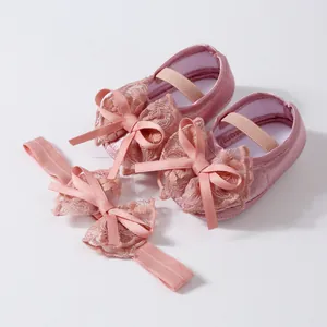 Pink baby girl soft sole walker shoes with matching lace bow headband for newborns