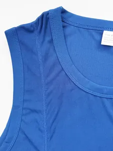 Close-up detail of blue ribbed knit fabric on a men's slim fit athletic fitness tank top