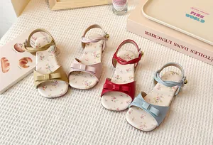 Girl's cute floral flat sandals with bow detail in various pastel and red colors