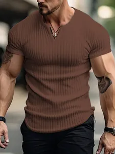 Close-up of men's slim fit ribbed knit Henley t-shirt in brown color