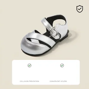 Elegant shiny silver metallic baby girl sandals with velcro straps and buckle detail