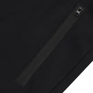 Close-up detail of a high-quality black waterproof zipper on American style sports shorts