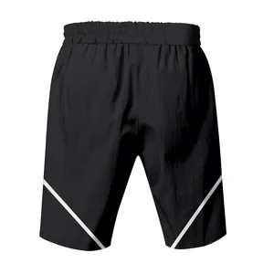 Back view of black men's athletic shorts featuring white V-shaped stripes detail