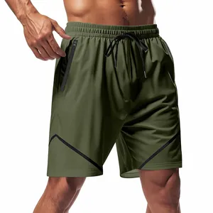 Detail view of men's olive athletic shorts featuring zipper pocket and drawstring