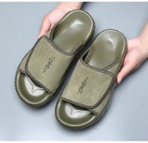 Close-up detail of premium men's leather slides featuring non-slip EVA thick sole