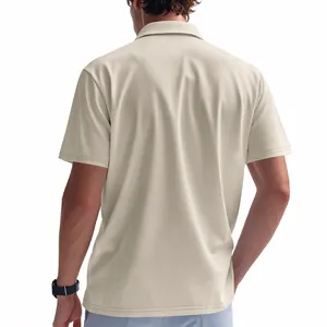 Detailed back view of a men's waffle knit short sleeve polo shirt in beige color