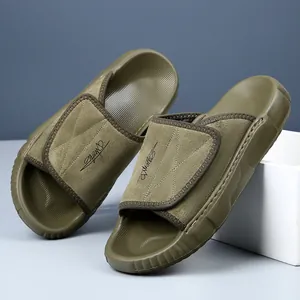 Claquettes homme en cuir vert olive avec semelle épaisse en EVA et broderie élégante.