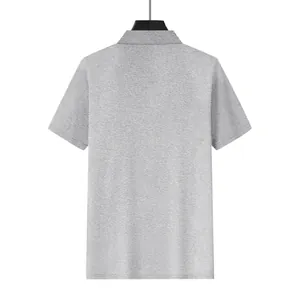 Back view of premium men's light gray waffle knit short sleeve Polo shirt on hanger