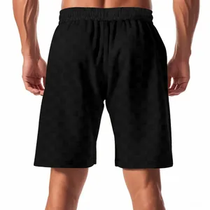 Vista trasera detallada de los pantalones cortos de jacquard a cuadros negros para hombre.