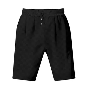 Primer plano de la textura de jacquard de damero pesado en pantalones cortos negros