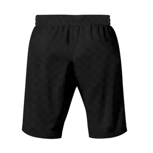 Vista detallada de pantalones cortos negros para hombre con un patrón jacquard de cuadros.