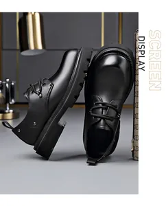 Detail view of black platform Derby shoes with glossy finish and thick soles