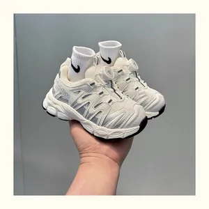 Breathable kids' chunky sneaker with a quick-release rotary knob closure.