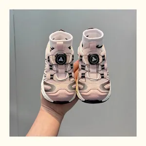Close-up of pink children's sneakers featuring a convenient rotary buckle system