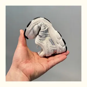 Detailed macro shot showing the high flexibility of a breathable kids' sneaker sole