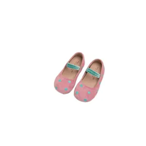 Adorable girls' pink polka dot flat shoes featuring a soft green velvet elastic strap