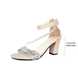 Elegant nude block heel sandals with shimmering rhinestone strap and ankle buckle