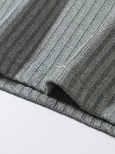 Detailed macro view of the grey ribbed knit fabric texture on a high-quality men's sports vest