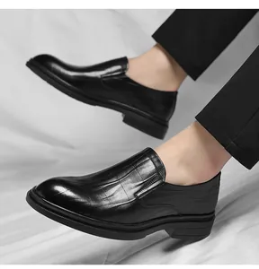 Close-up of men's black textured slip-on leather shoes for office and business wear.