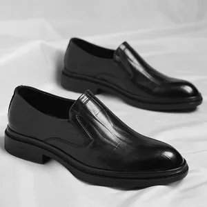 Classic men's black slip-on dress shoes with crocodile texture for business formal wear