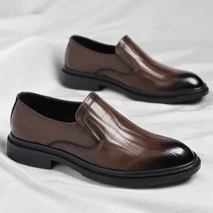 Elegant brown slip-on business leather shoes with gradient toe and embossed texture