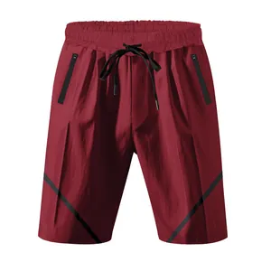 Pantaloncini sportivi bordeaux uomo asciugatura rapida con tasche con zip e strisce