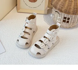 Detail shot of toddler off-white Roman sandals with high-top and closed-toe design.