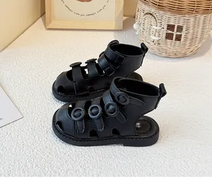 Stylish black closed-toe toddler gladiator sandals featuring triple buckle straps for kids