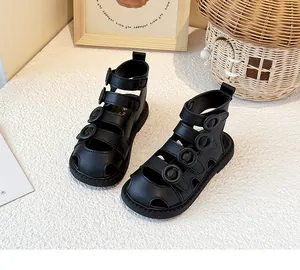 Detailed view of black toddler high-top Roman sandals with protective closed-toe design.