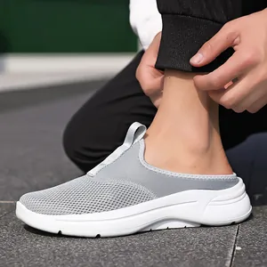 Close-up of grey breathable mesh slip-on casual mule shoes for outdoor wear