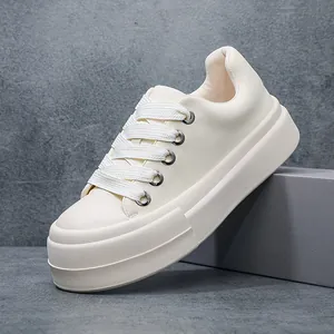 Side detail view of men's chunky platform sneaker in premium off-white leather finish