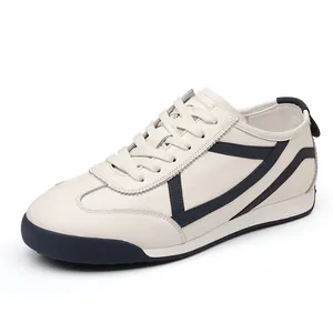 Classic men's retro German Army Trainer GAT sneakers in cream leather with dark accents