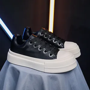 Side view of premium men's chunky black and white platform casual sneakers with thick soles