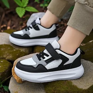 Baskets en cuir à semelle épaisse pour garçons noir et blanc avec scratch sportives