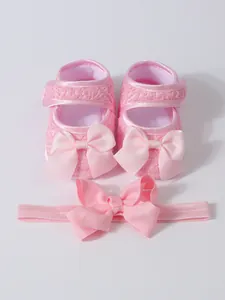Rosa Babyschuhe mit weicher Sohle und passendem Schleifen-Stirnband für Mädchen