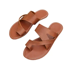 Women's retro brown faux leather flat beach sandals with toe loop and cross strap design