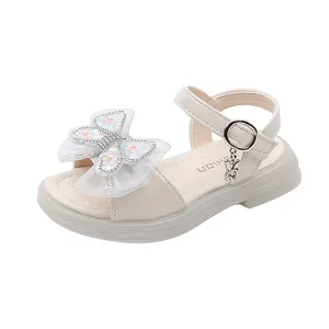 Elegant beige girls princess sandals with oversized sequin butterfly bow