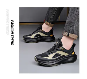 Detail view of breathable men's sneakers with chunky foam sole and lace-up design