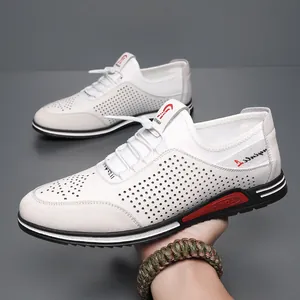 Men's breathable white casual leather shoes with hollow perforated design and soft sole