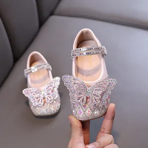 Pink girl's princess shoes with sparkling rhinestone butterfly decoration