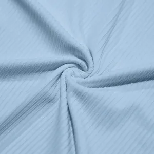 Primer plano detallado de la textura de tela acanalada azul claro para conjuntos de hombre