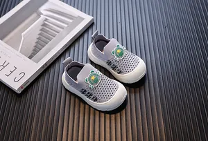 Detail view of purple toddler fly-woven sneakers with cute cartoon frog patch decoration