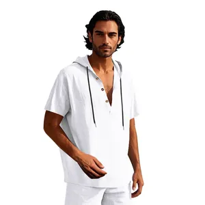 Close-up of men's white linen hooded Henley shirt with three-button closure and drawstrings.