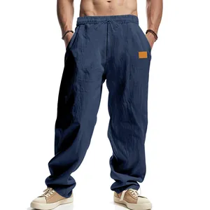 Detail view of men's breathable dark blue linen wide-leg casual pants for summer