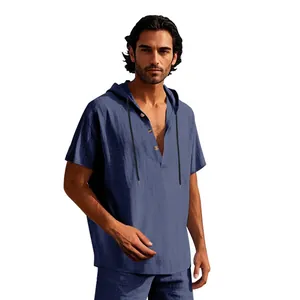 Close-up of a blue linen hooded Henley shirt for men in a loose beach style