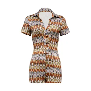 Detailed macro shot of women's short sleeve romper featuring a colorful zigzag wave pattern