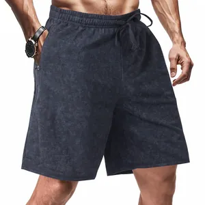 Macro detail showing the unique tie-dye pattern and drawstring waist of men's casual shorts