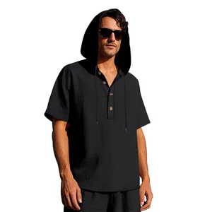 Detailed view of men's black linen short sleeve hooded Henley shirt featuring wood buttons